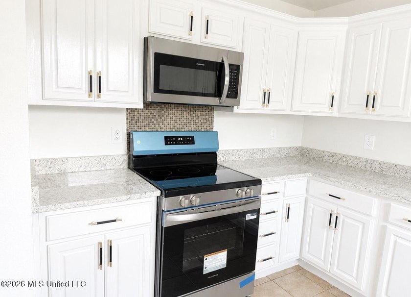 This beautifully updated 4-bedroom, 2-bath home is located in a - photo 7