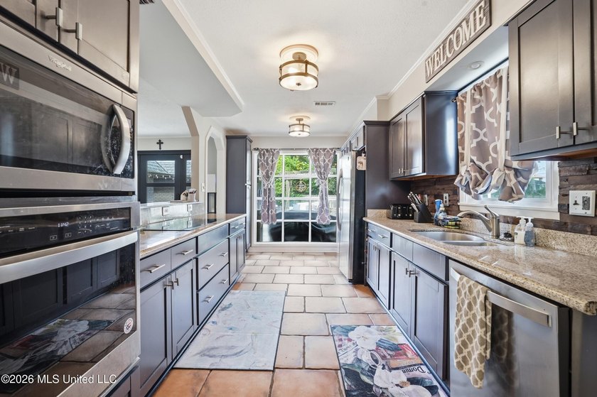 Welcome to 2553 Mercedes Drive, where timeless elegance meets - photo 14