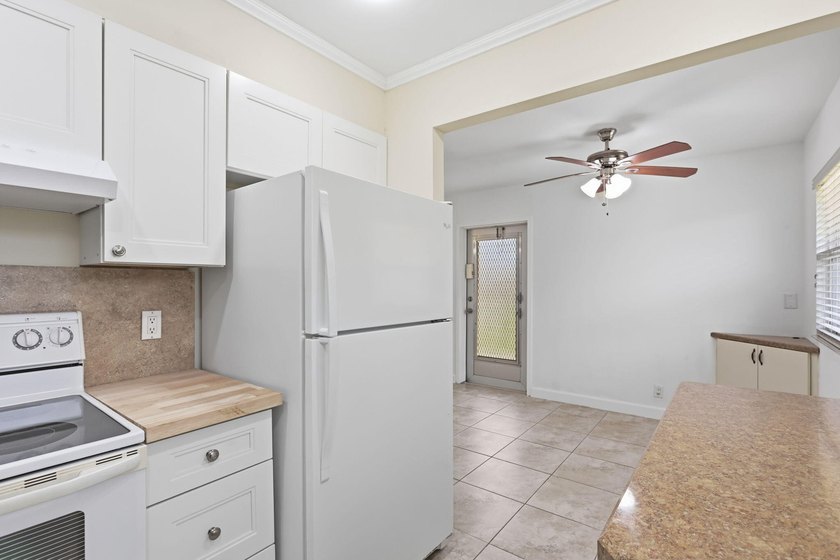This highly updated two bedroom, two bath first floor end Unit - photo 3