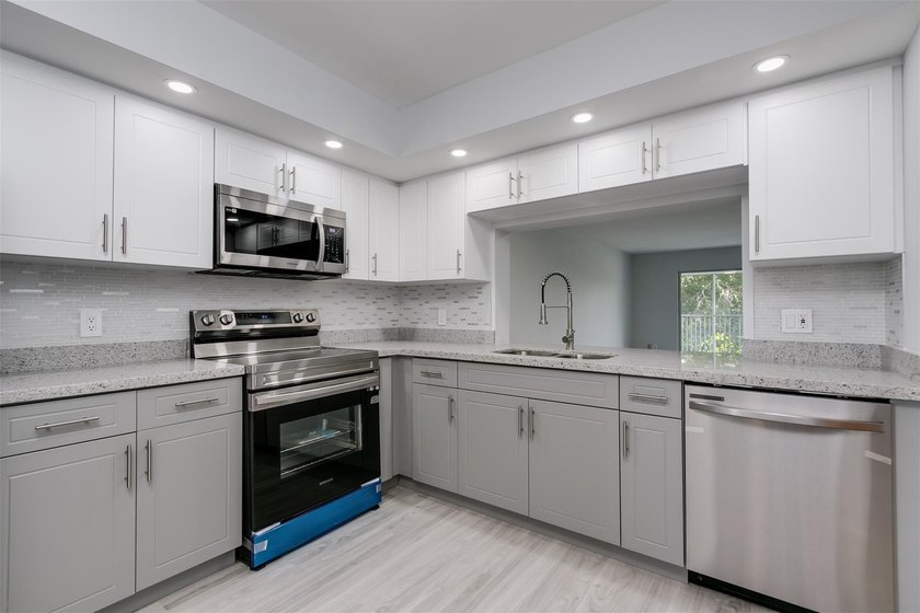 Updated 2 bedroom, 2 bath condo in Century Village in excellent - photo 3