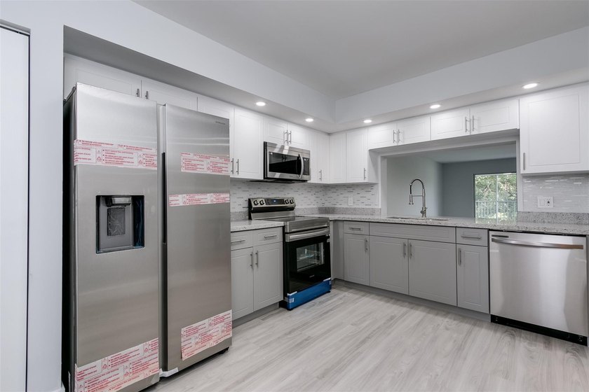 Updated 2 bedroom, 2 bath condo in Century Village in excellent - photo 4