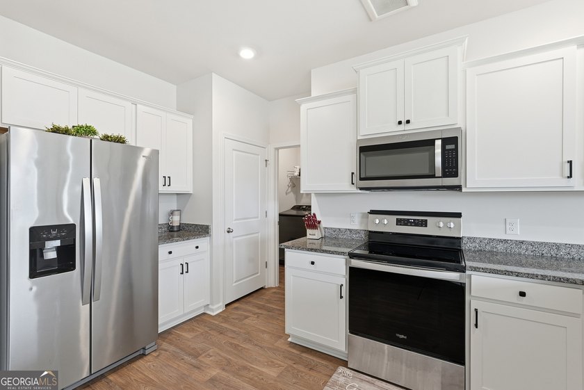 Nestled in a sought-after gated community off Highlands Blvd - photo 11