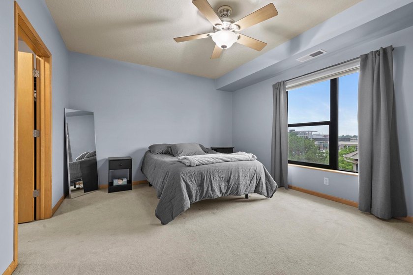Discover this top floor condo offering over 1,300 square feet of - photo 11
