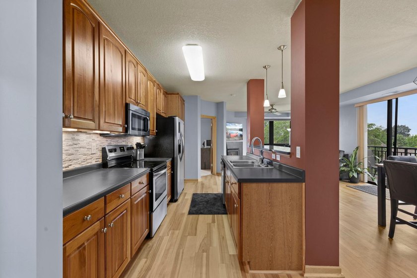 Discover this top floor condo offering over 1,300 square feet of - photo 19