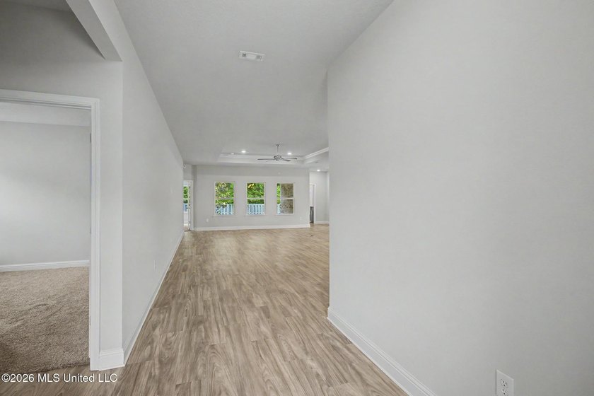 BACK ON MARKET... Buyer's sale fell through. Nestled near the - photo 2