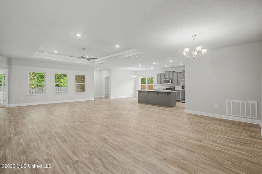 BACK ON MARKET... Buyer's sale fell through. Nestled near the - photo 3