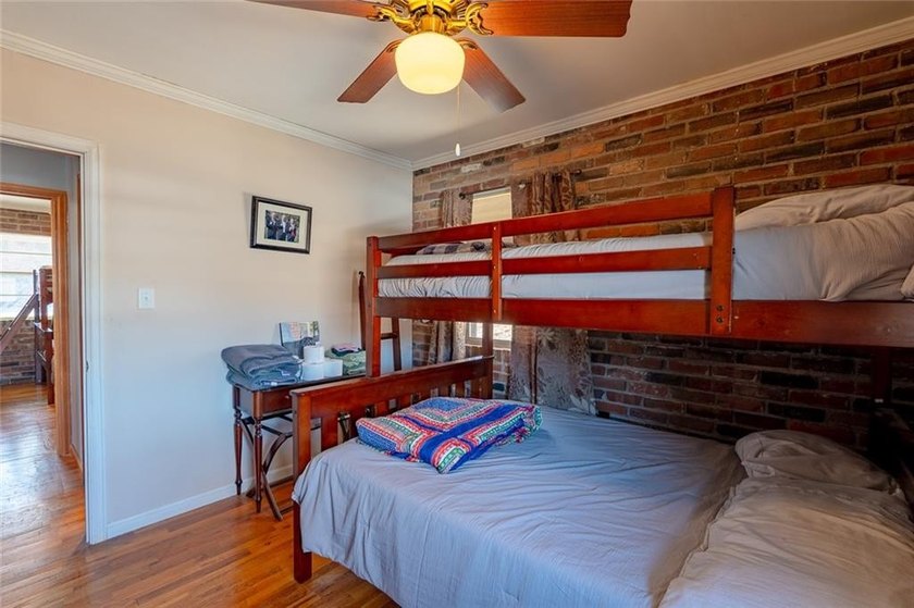 Nestled at the 8 MM in Buck Creek Cove, this lakefront retreat - photo 25