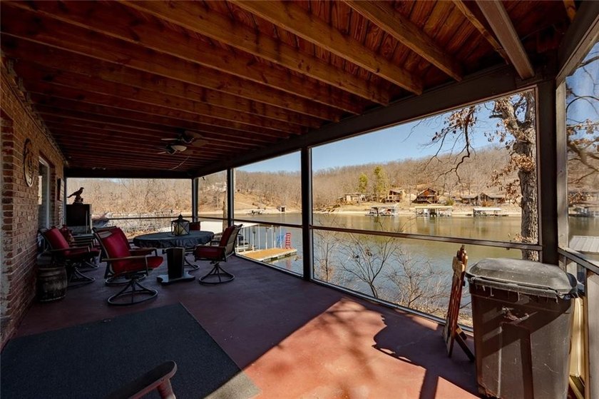 Nestled at the 8 MM in Buck Creek Cove, this lakefront retreat - photo 36