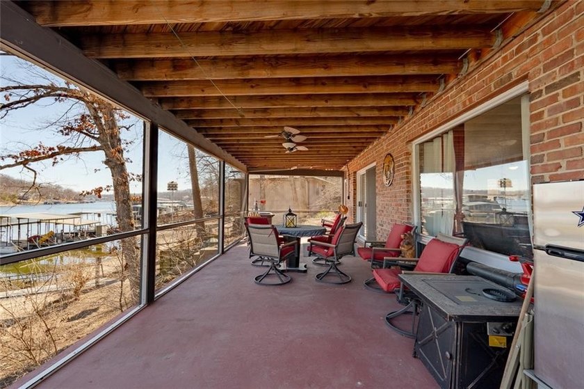 Nestled at the 8 MM in Buck Creek Cove, this lakefront retreat - photo 38