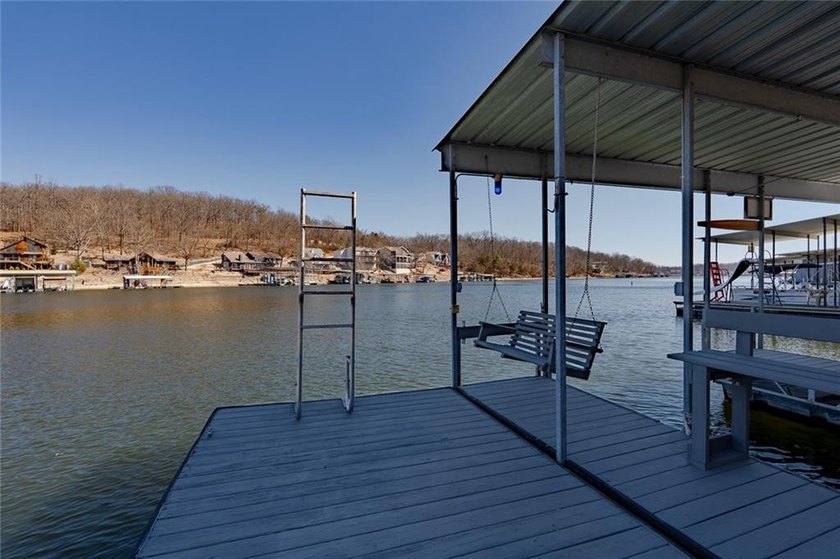 Nestled at the 8 MM in Buck Creek Cove, this lakefront retreat - photo 45