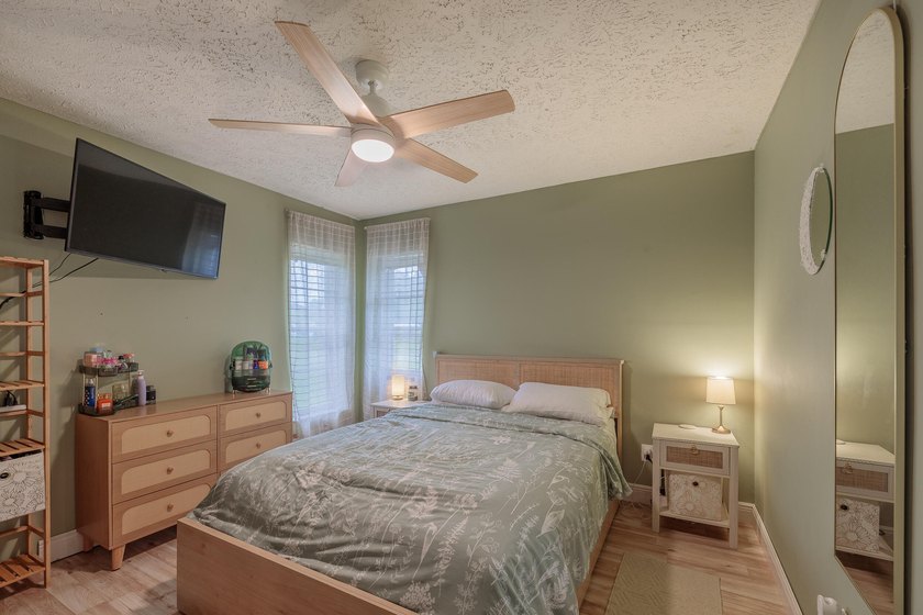 Welcome to this charming 2-bedroom, 2-bath pool home in the - photo 15