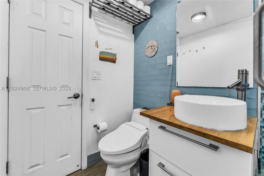 Welcome to your turn-key coastal retreat at 645 NE 77th Street - photo 22
