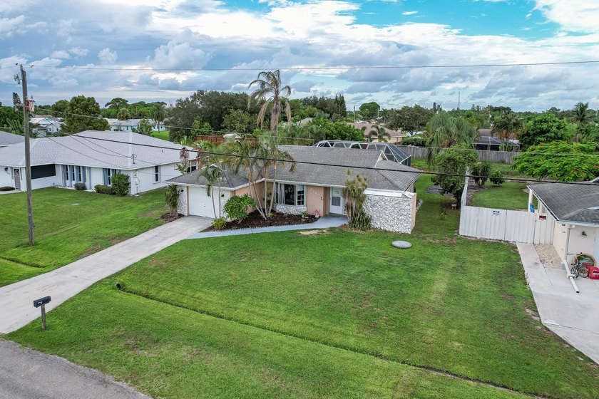 Welcome to this charming 2-bedroom, 2-bath pool home in the - photo 25