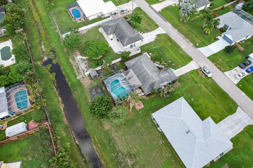 Welcome to this charming 2-bedroom, 2-bath pool home in the - photo 30