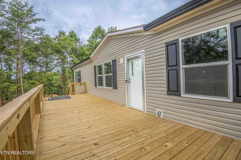 Brand-New Lake Living Awaits! Experience the perfect blend of - photo 2