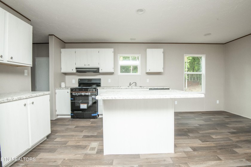 Brand-New Lake Living Awaits! Experience the perfect blend of - photo 6