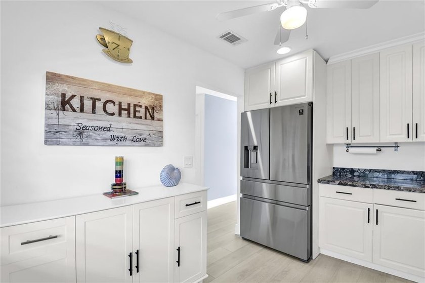 FURNISHED LAKEFRONT CORNER UNIT CONDO in the desirable Cypresses - photo 12