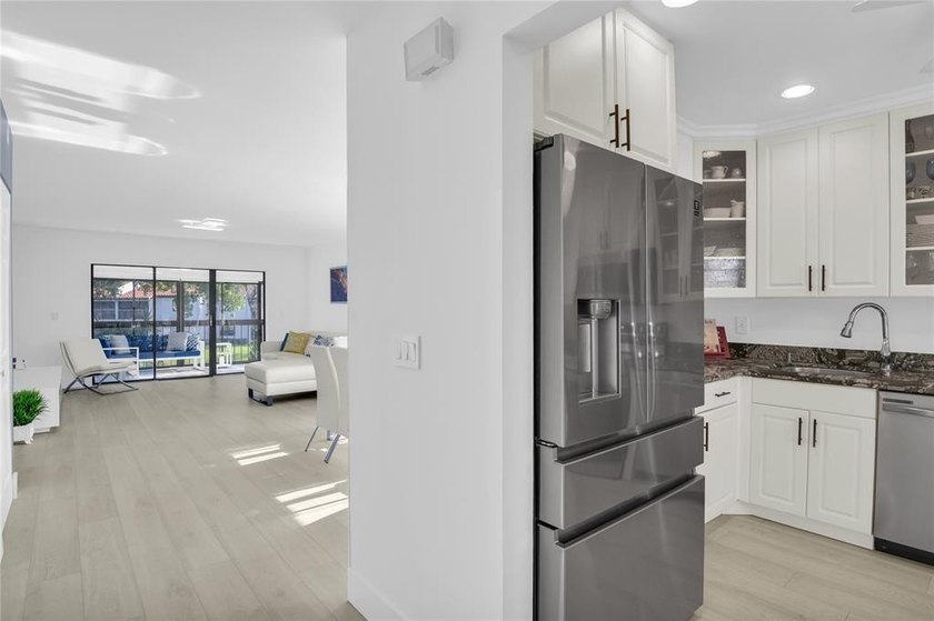 FURNISHED LAKEFRONT CORNER UNIT CONDO in the desirable Cypresses - photo 15