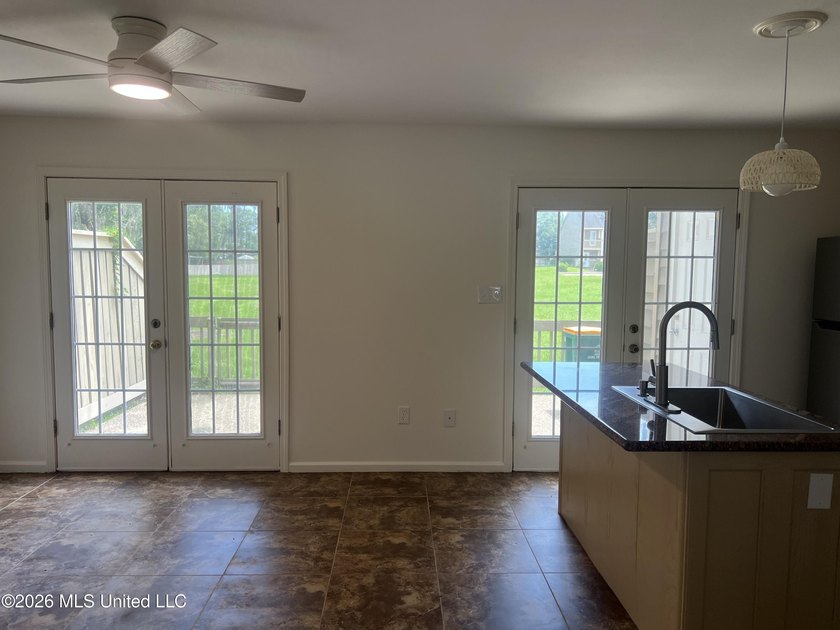 Desirable end unit 2BR/2.5BA townhouse with stylish updates - photo 8