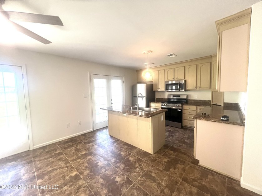 Desirable end unit 2BR/2.5BA townhouse with stylish updates - photo 9