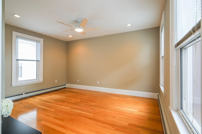 This well-maintained West End three-unit presents a rare - photo 33