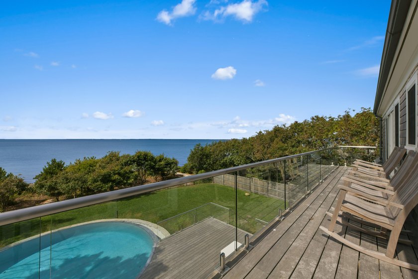 This stunning waterfront home is nestled within a coveted North - photo 15