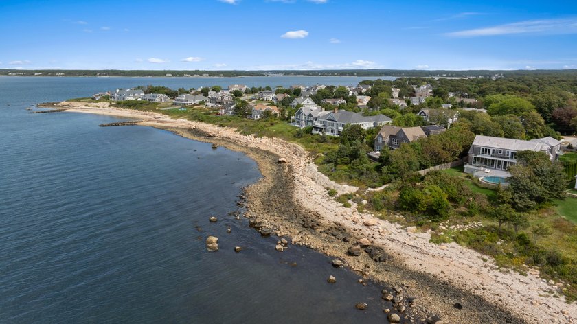 This stunning waterfront home is nestled within a coveted North - photo 17