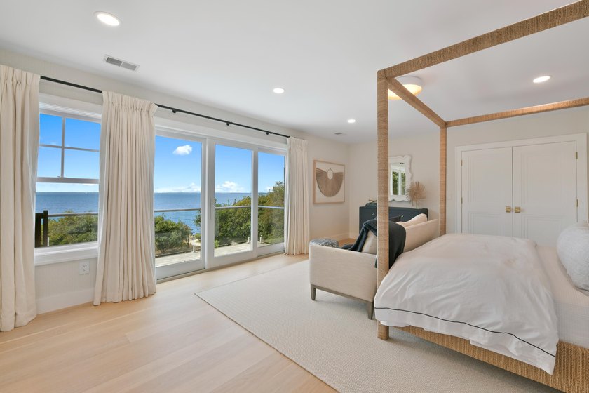 This stunning waterfront home is nestled within a coveted North - photo 23