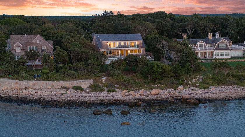 This stunning waterfront home is nestled within a coveted North - photo 34