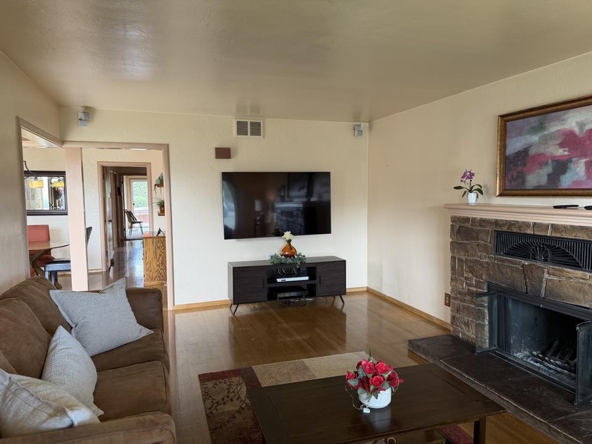 Situated on a spacious 7,000+/- sq. ft. corner lot, this home - photo 3