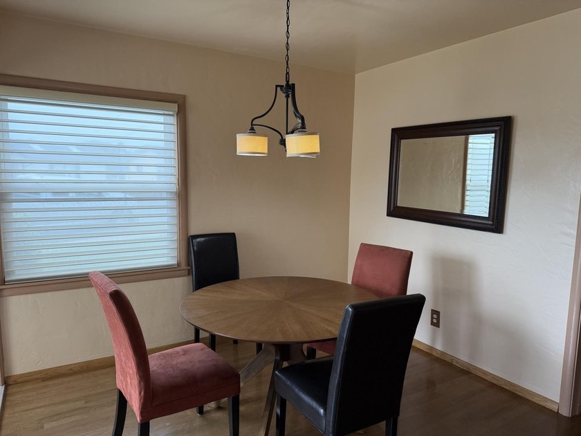 Situated on a spacious 7,000+/- sq. ft. corner lot, this home - photo 6