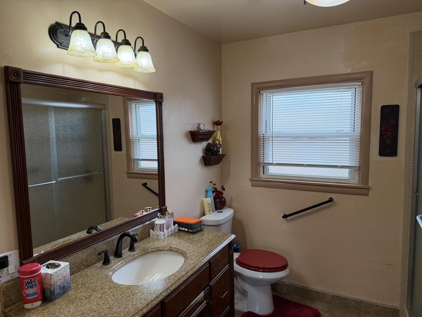 Situated on a spacious 7,000+/- sq. ft. corner lot, this home - photo 9
