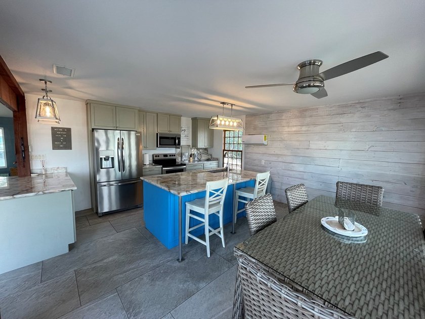Waterfront 3/3 on Key Allegro featuring a large dock, boat lift - photo 9