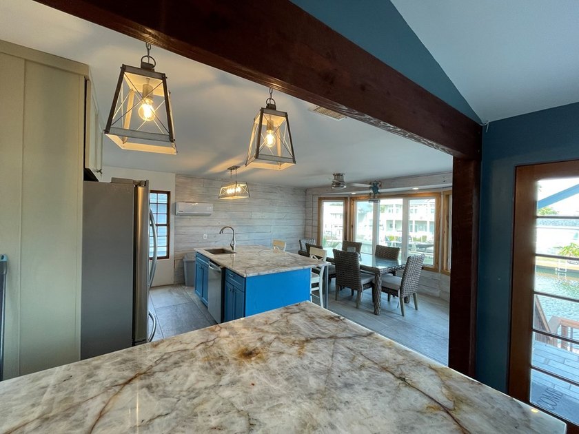 Waterfront 3/3 on Key Allegro featuring a large dock, boat lift - photo 10