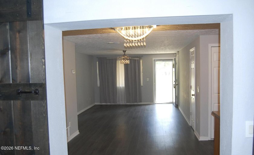 Step into this cozy 3-bedroom, 3-bathroom home nestled in a - photo 2