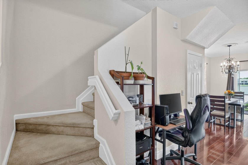 Welcome to this WATERFRONT END UNIT TOWNHOME in Emerald Lakes of - photo 9