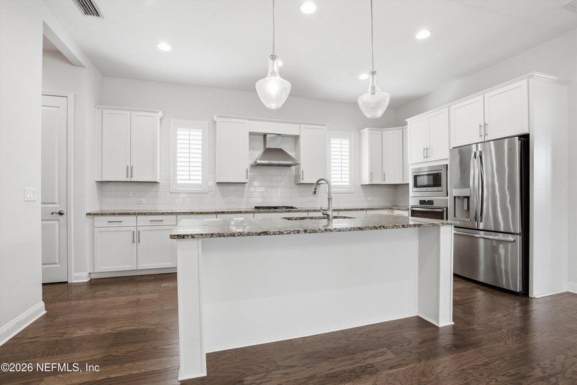 This beautifully maintained home offers the perfect blend of - photo 8