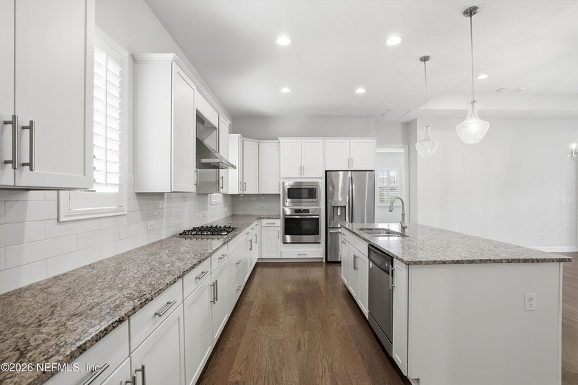 This beautifully maintained home offers the perfect blend of - photo 9