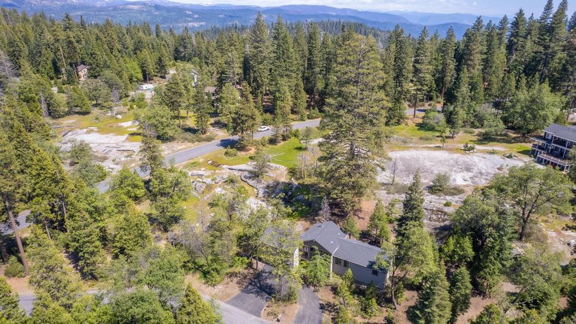 Nestled in the prestigious Bretz Mountain community, this - photo 4
