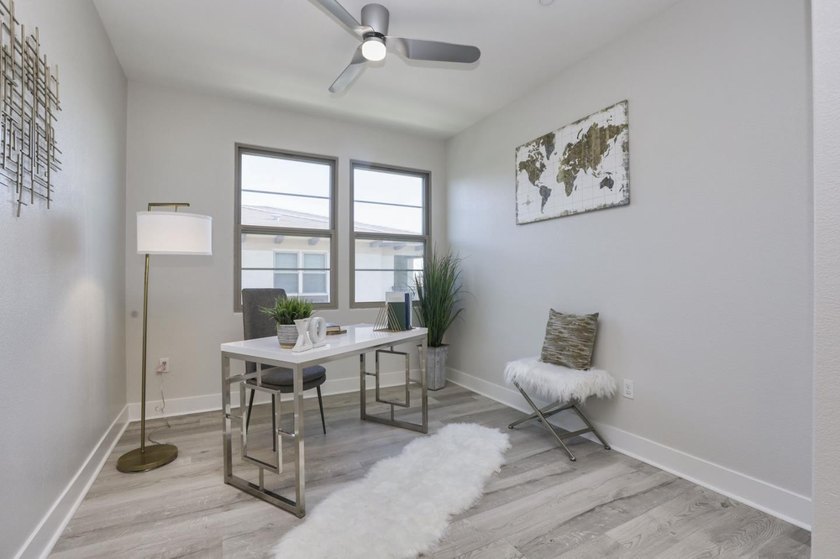 Welcome to 1089 Dewberry Place #401, a stunning top-floor corner - photo 4