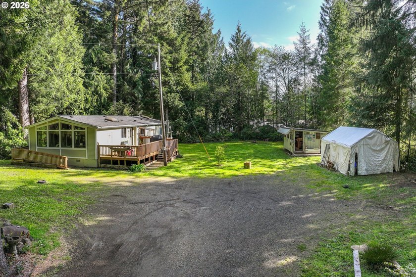 Surrounded with lush trees and shrubs in a beautiful deep - photo 4