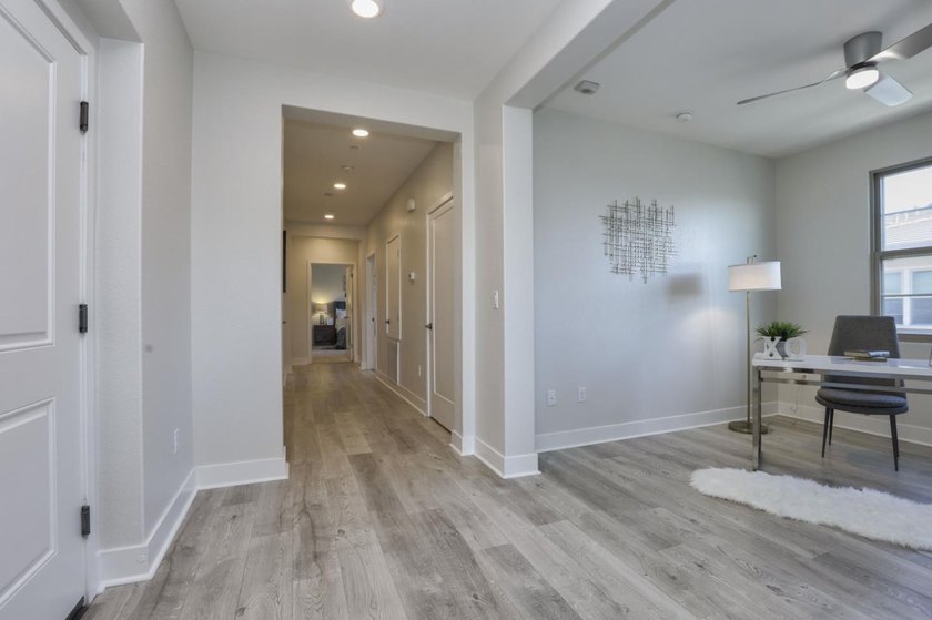 Welcome to 1089 Dewberry Place #401, a stunning top-floor corner - photo 6