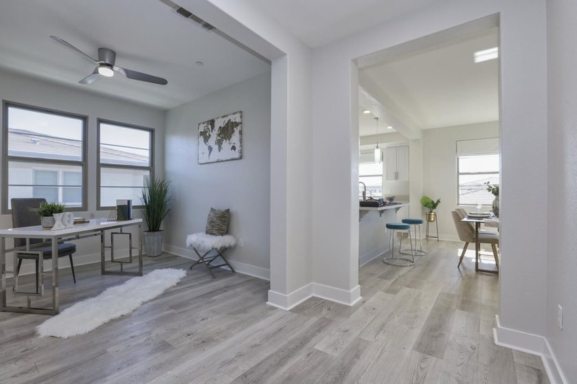 Welcome to 1089 Dewberry Place #401, a stunning top-floor corner - photo 7