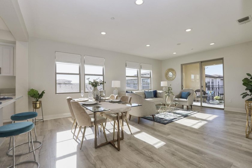 Welcome to 1089 Dewberry Place #401, a stunning top-floor corner - photo 8