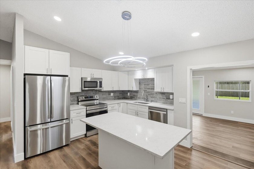 4 BR, 2 BA totally updated. Exterior features all new thermo - photo 5