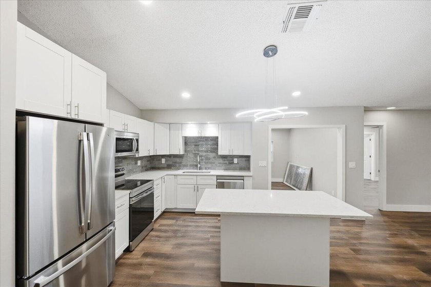 4 BR, 2 BA totally updated. Exterior features all new thermo - photo 7