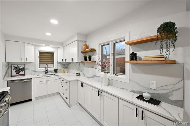 Welcome home to this beautifully updated three-bedroom, two - photo 19