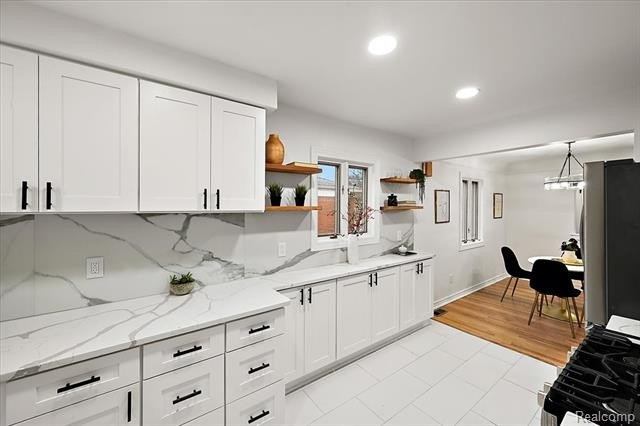 Welcome home to this beautifully updated three-bedroom, two - photo 21