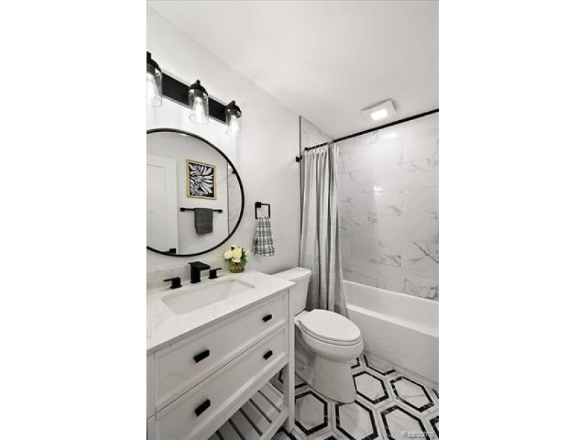 Welcome home to this beautifully updated three-bedroom, two - photo 26