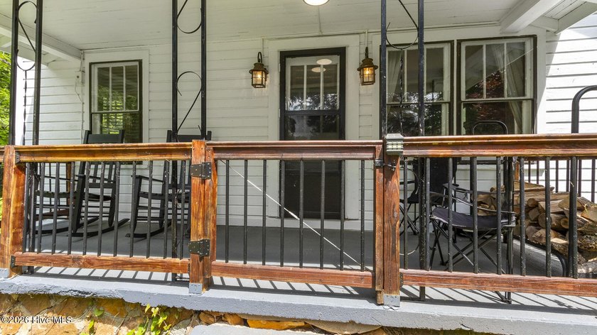 Discover a rare opportunity to own a charming 1940s mountain - photo 15